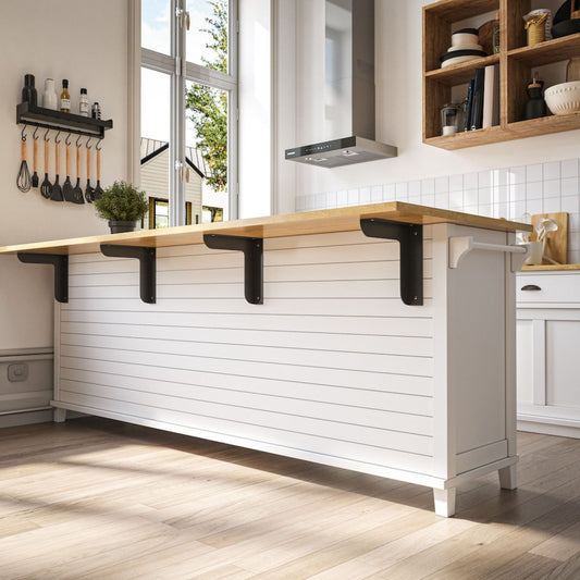 white kitchen island with butcher block counter top and bracket supports