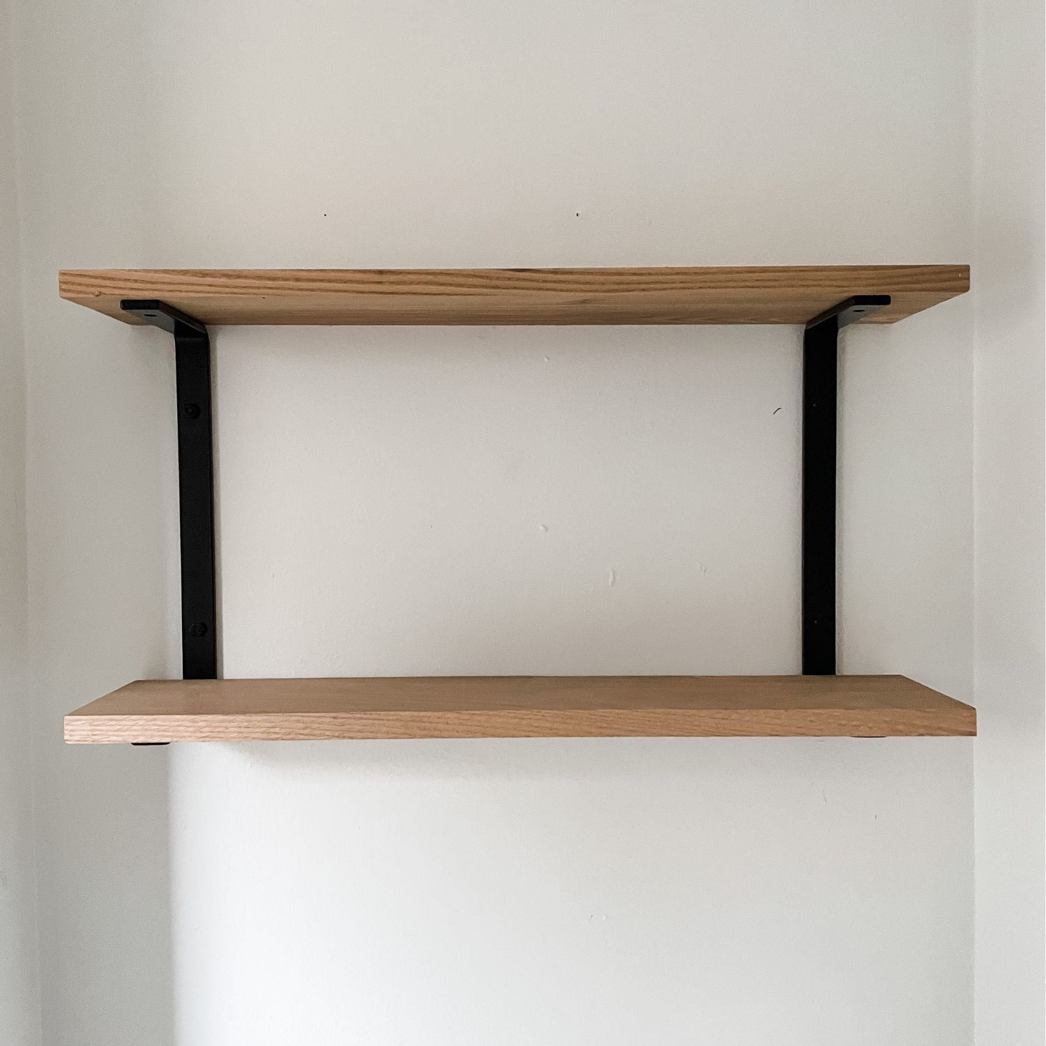 double shelf with black brackets