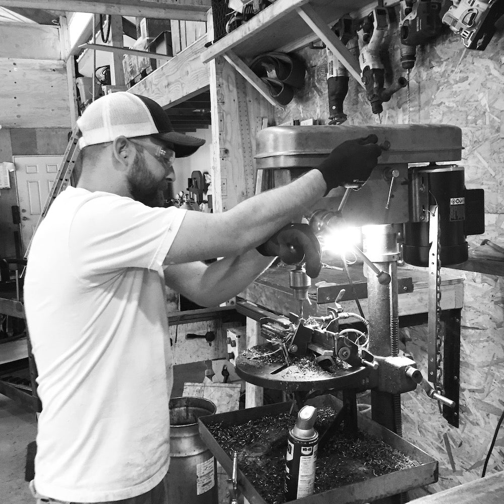 man working drill press - cascade iron co