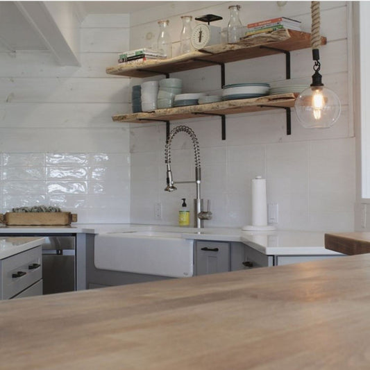 kitchen with wood shelves and metal brackets