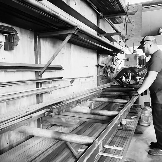 man working in metal shop