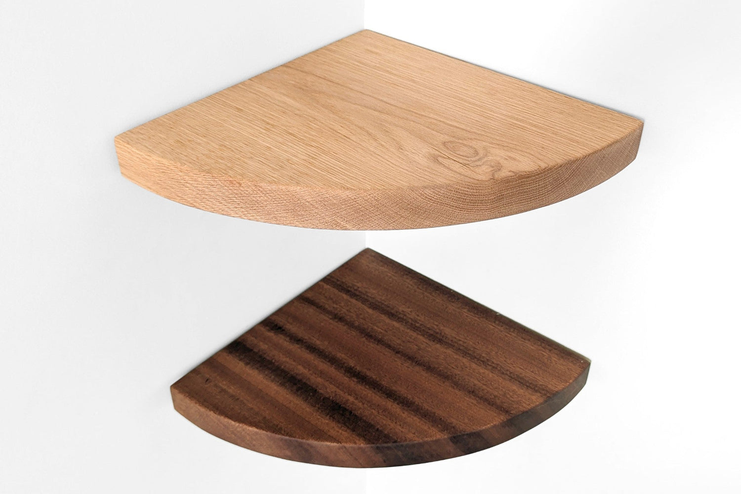 Two wooden corner shelves, one light wood and one dark wood, on a white background.