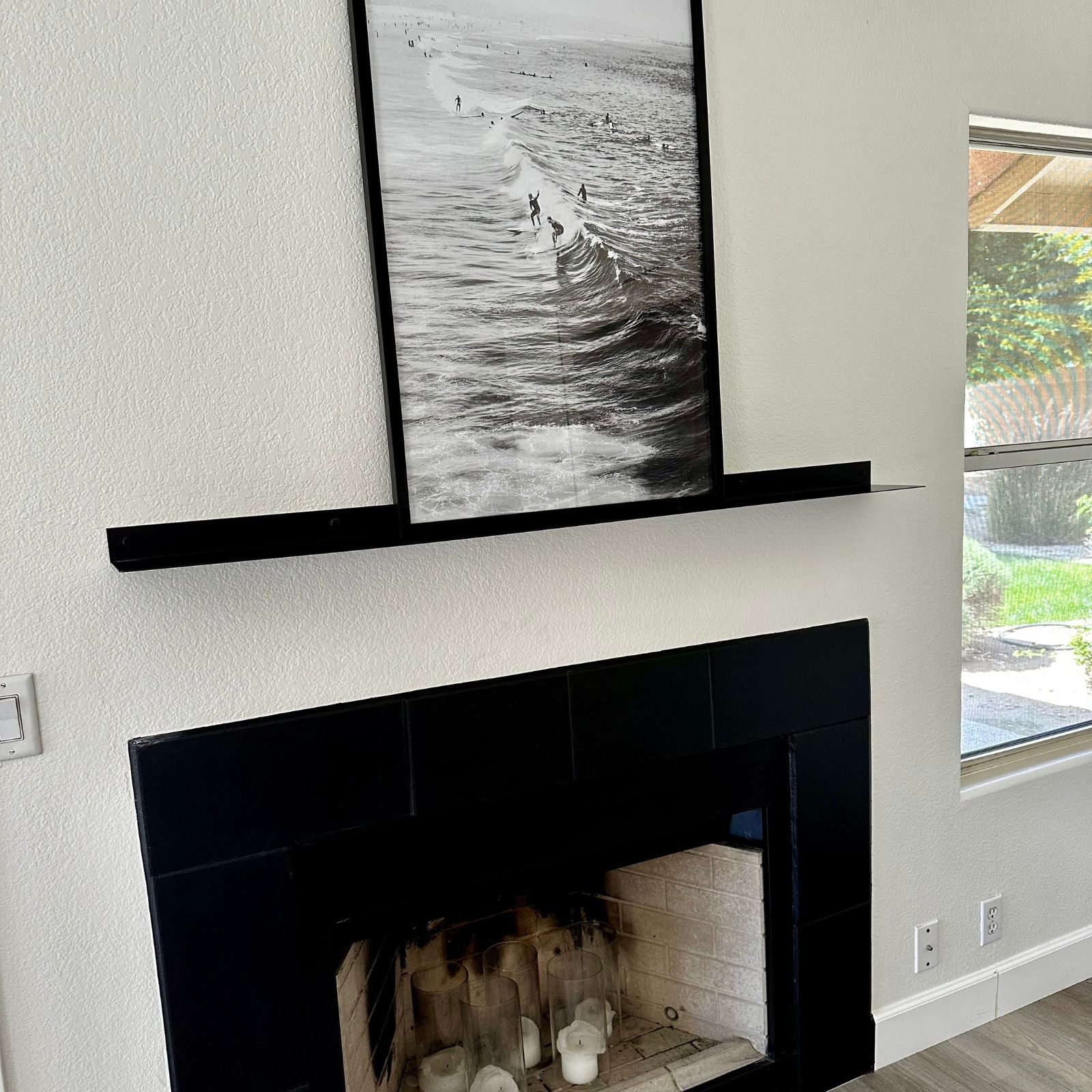 fireplace with black floating mantel