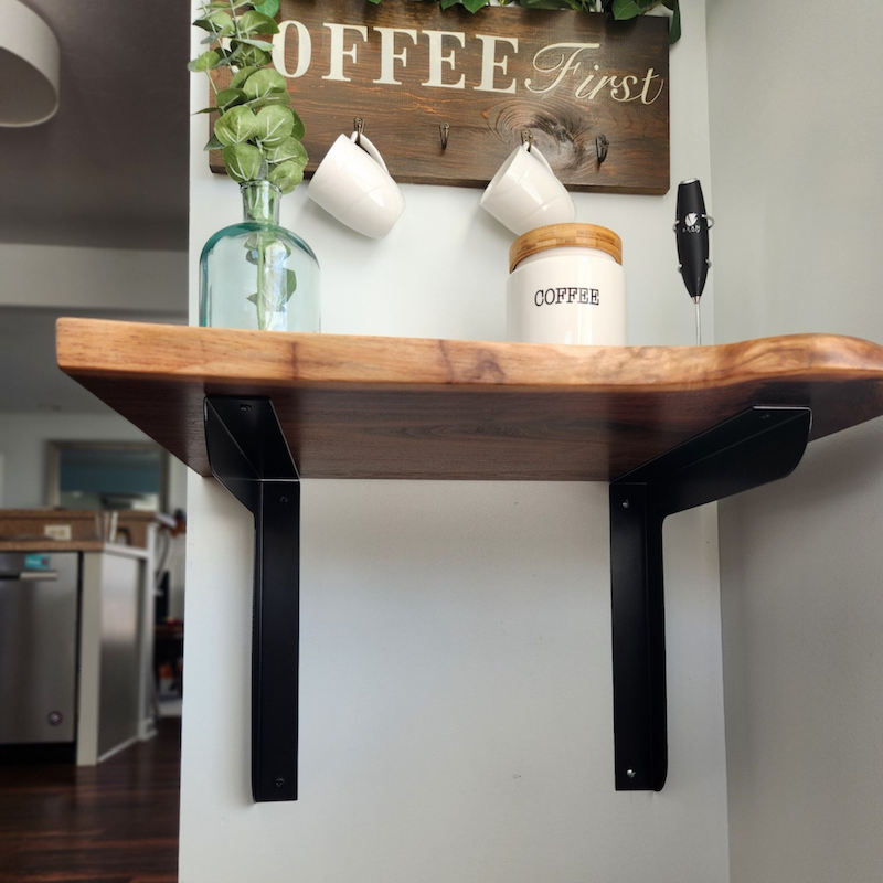 coffee station with wood counter and black brackets