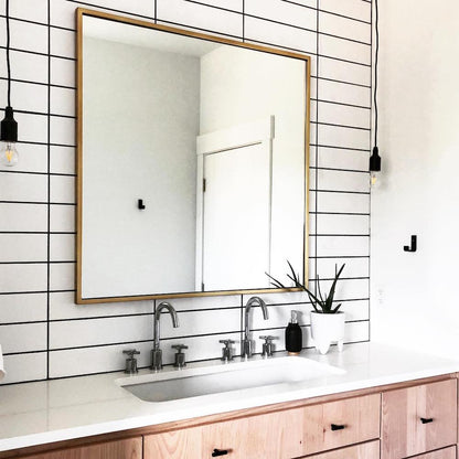 white modern bathroom with black hook