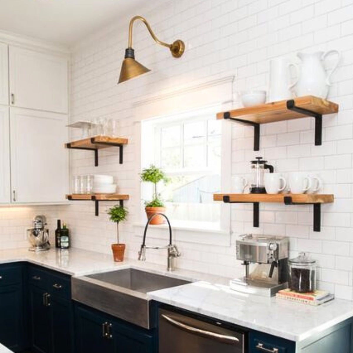 black kitchen brackets in white kitchen