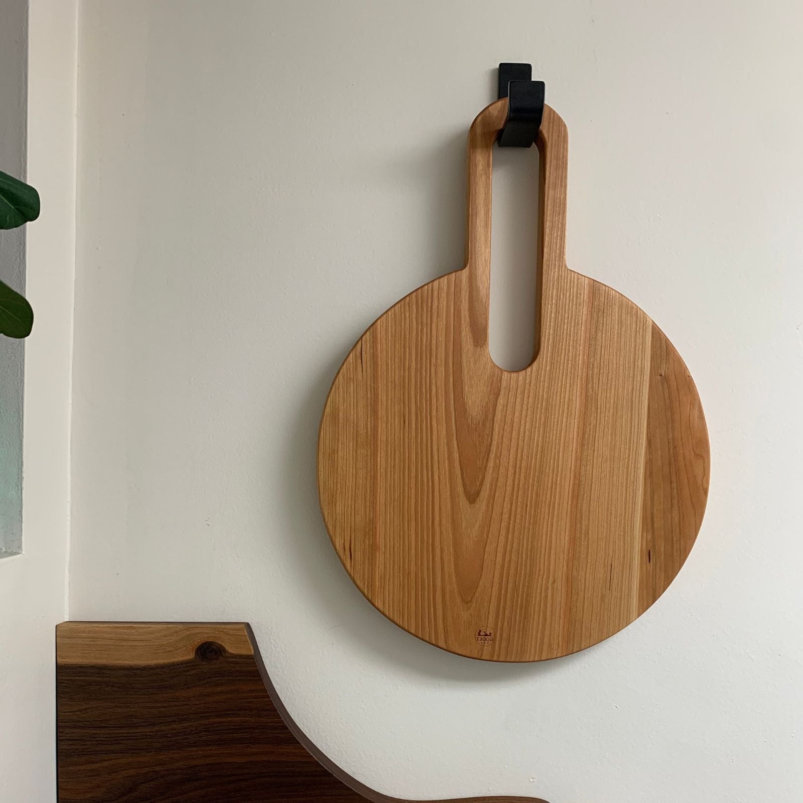 cutting board hanging by wall hook
