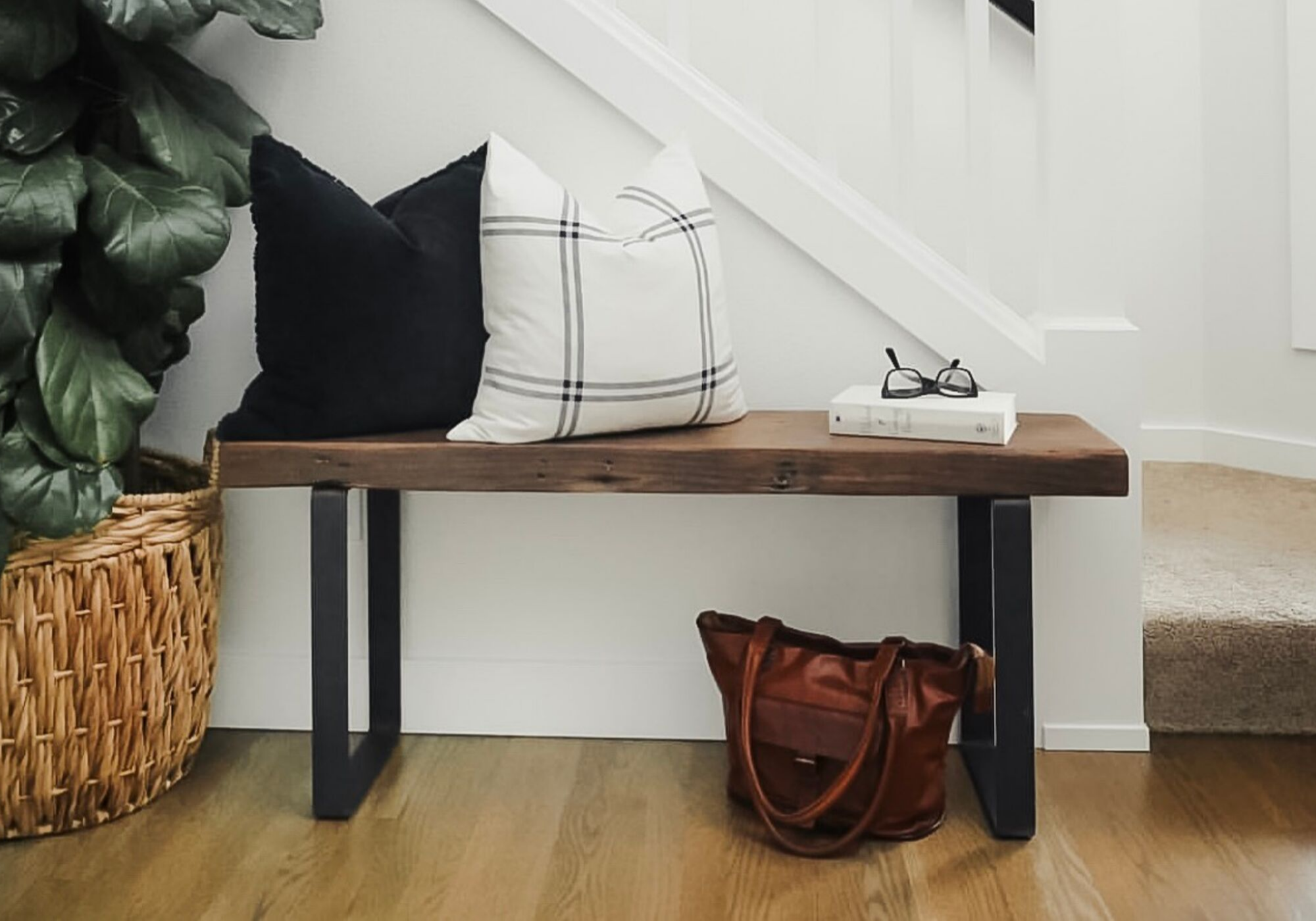 entryway with bench and bag