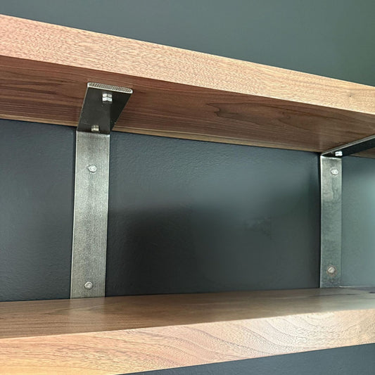 two wood shelves with steel double brackets