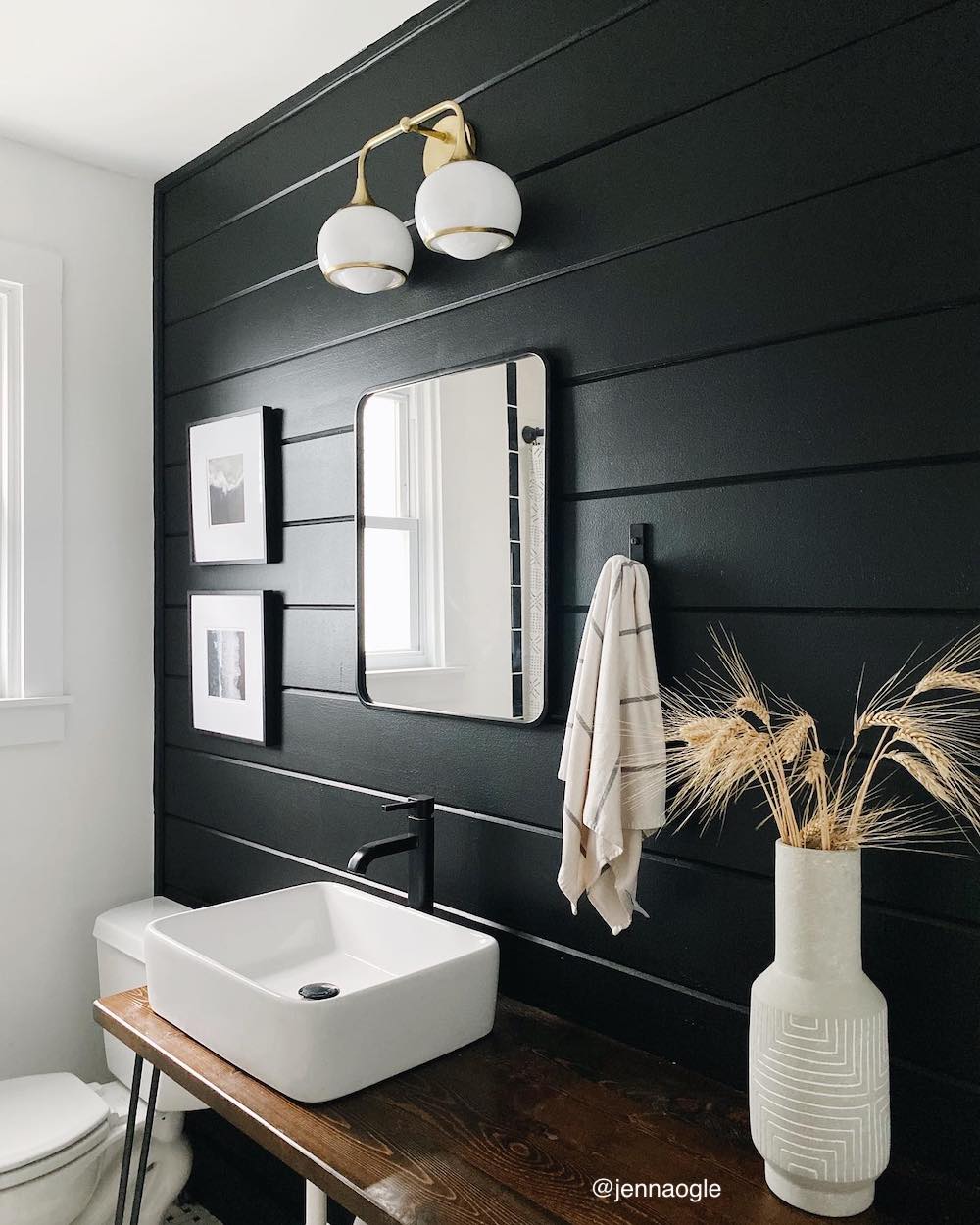 black bathroom with towel hook