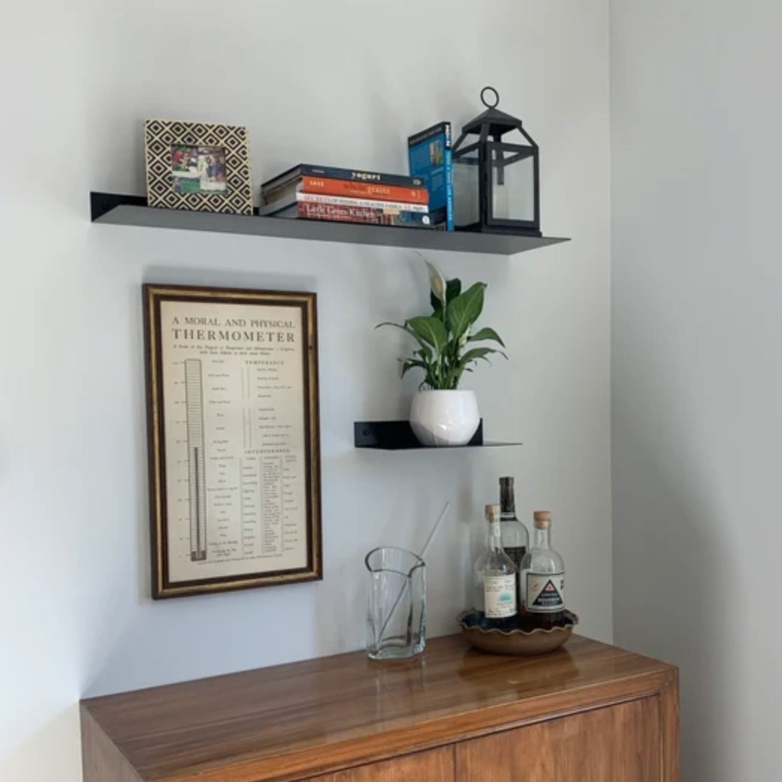 wall shelving with artwork