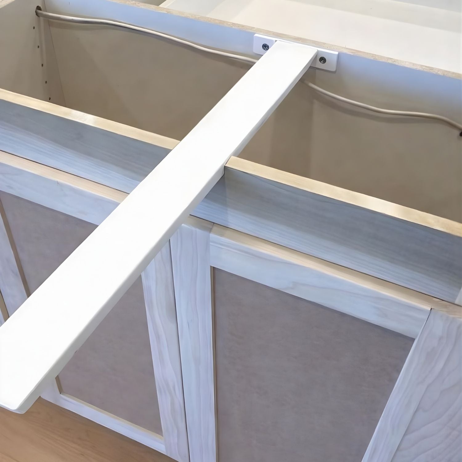 white metal hidden counter top bar support on cabinet base