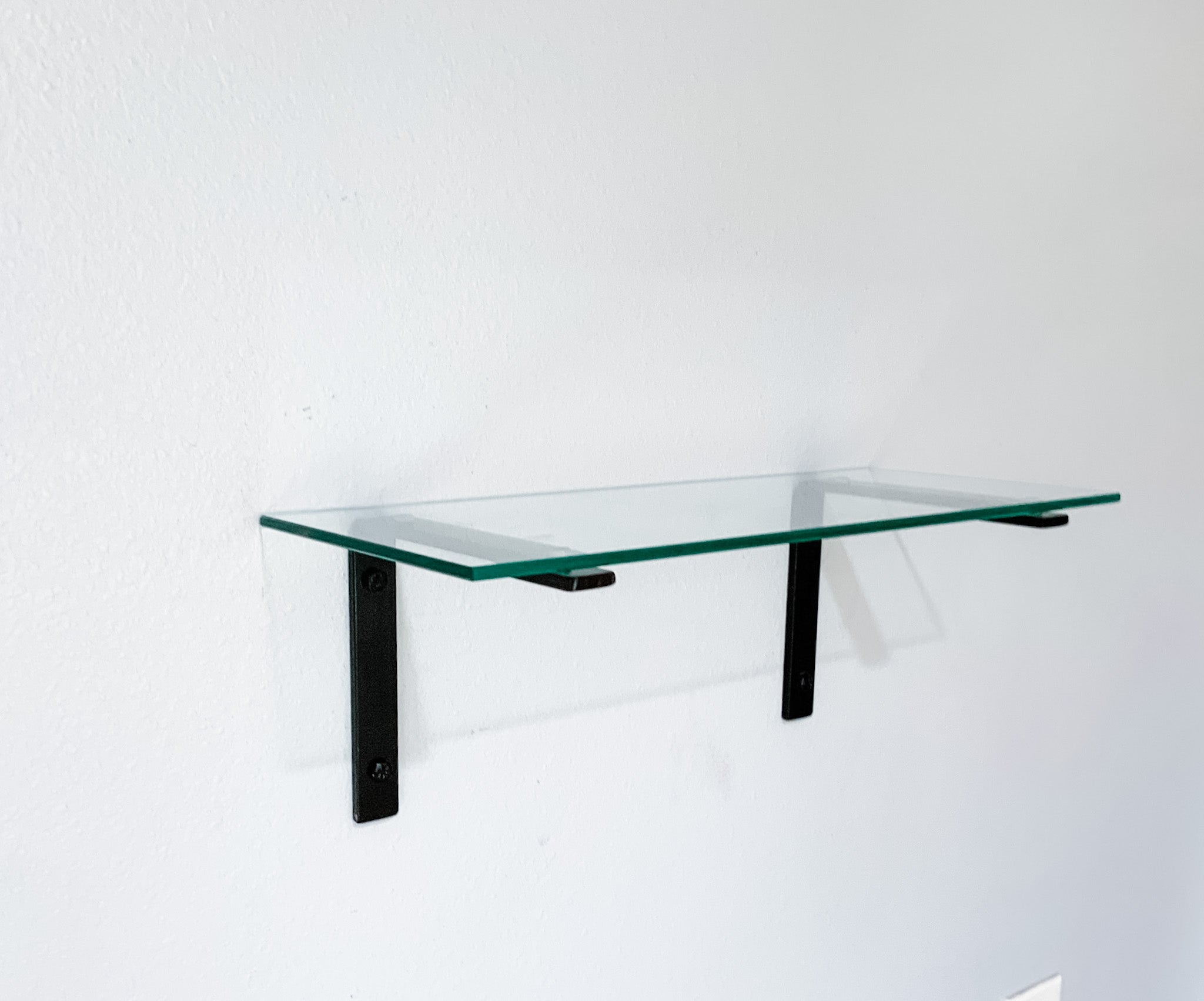 How to Install a Floating Glass Shelf